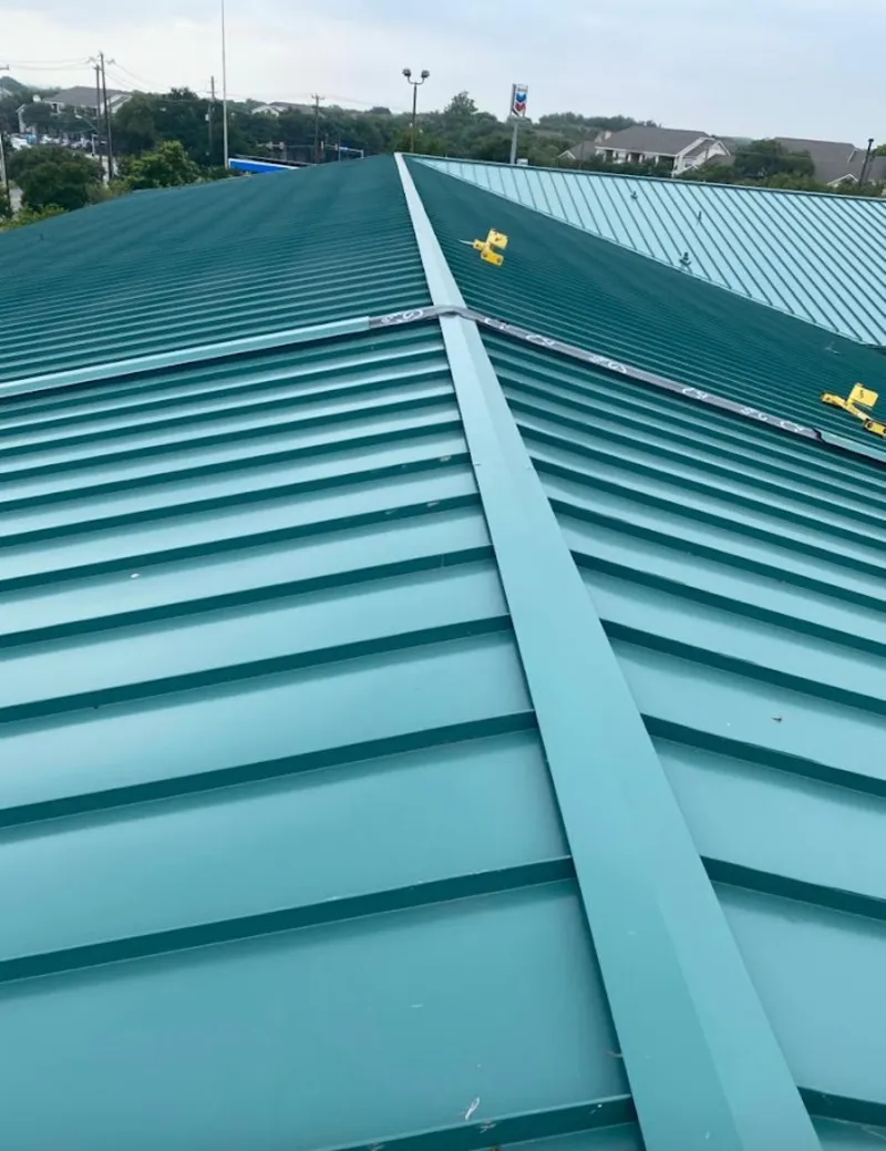 Green commercial metal roof ridge and valley for Metal Roof Repair in Central Point