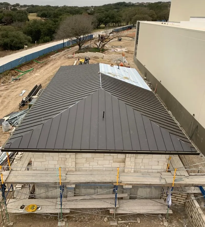 Metal roof new construction with scaffolding in Central Point